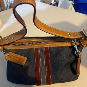 Small Coach hand bag.